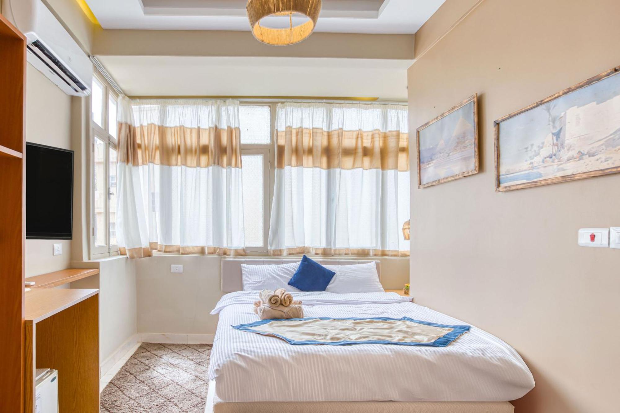 The Grand Pyramids View Hotel Kafret el-Gabal Zimmer foto