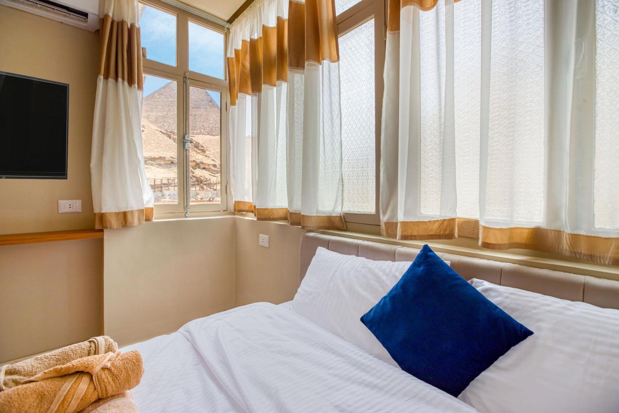 The Grand Pyramids View Hotel Kafret el-Gabal Zimmer foto