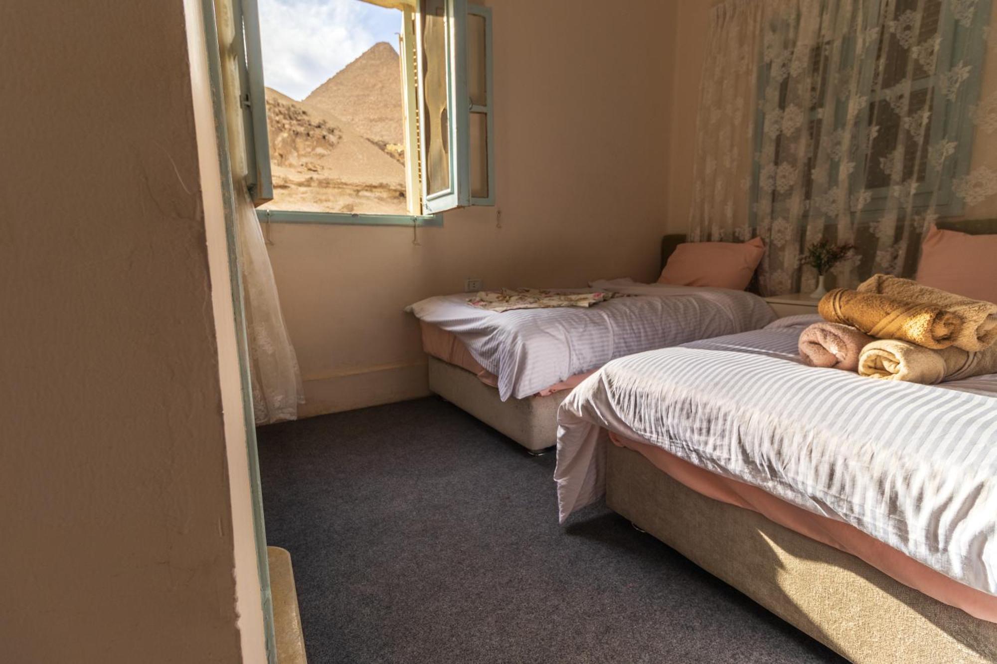 The Grand Pyramids View Hotel Kafret el-Gabal Zimmer foto