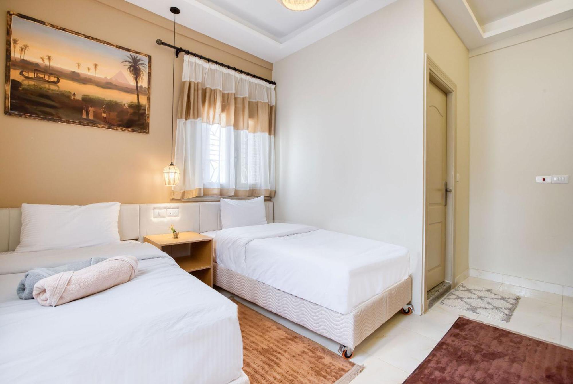 The Grand Pyramids View Hotel Kafret el-Gabal Zimmer foto